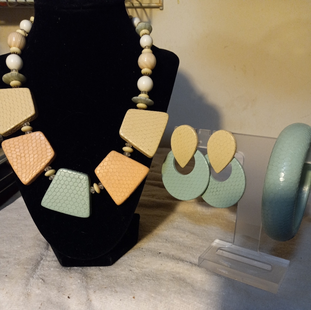 Not new,pastel vinyl  over plastic geometric 16in necklace clip earrings&bangle.